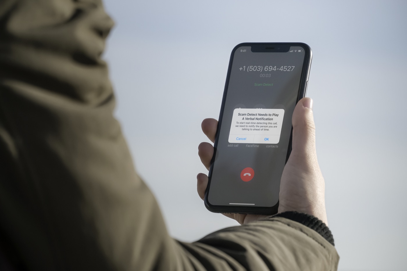 A scam-detection notification on a phone call
